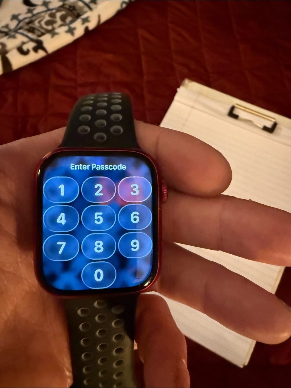 Red Apple Watch with Black Sport Band